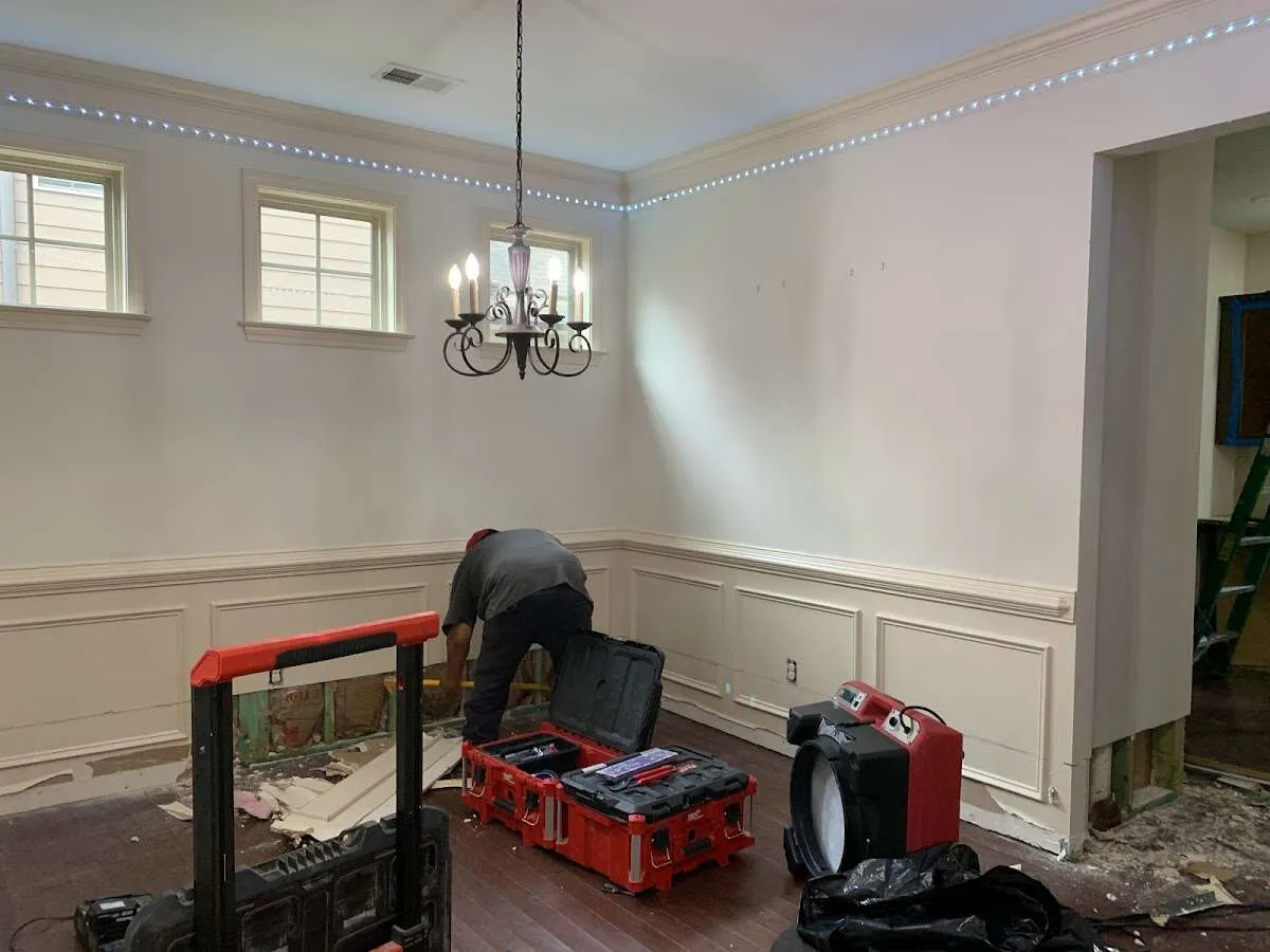 Restoration technician with professional equipment in Fairlawn